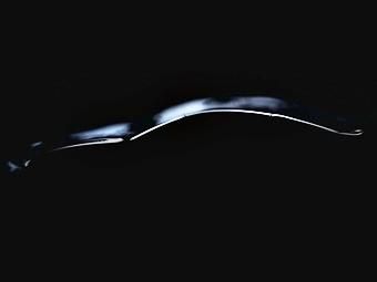 Aston Martin готовит к премьере загадочное купе (видео)