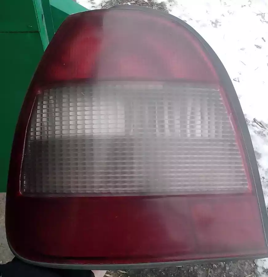 Фонарь задний левый к Nissan Sunny 1992