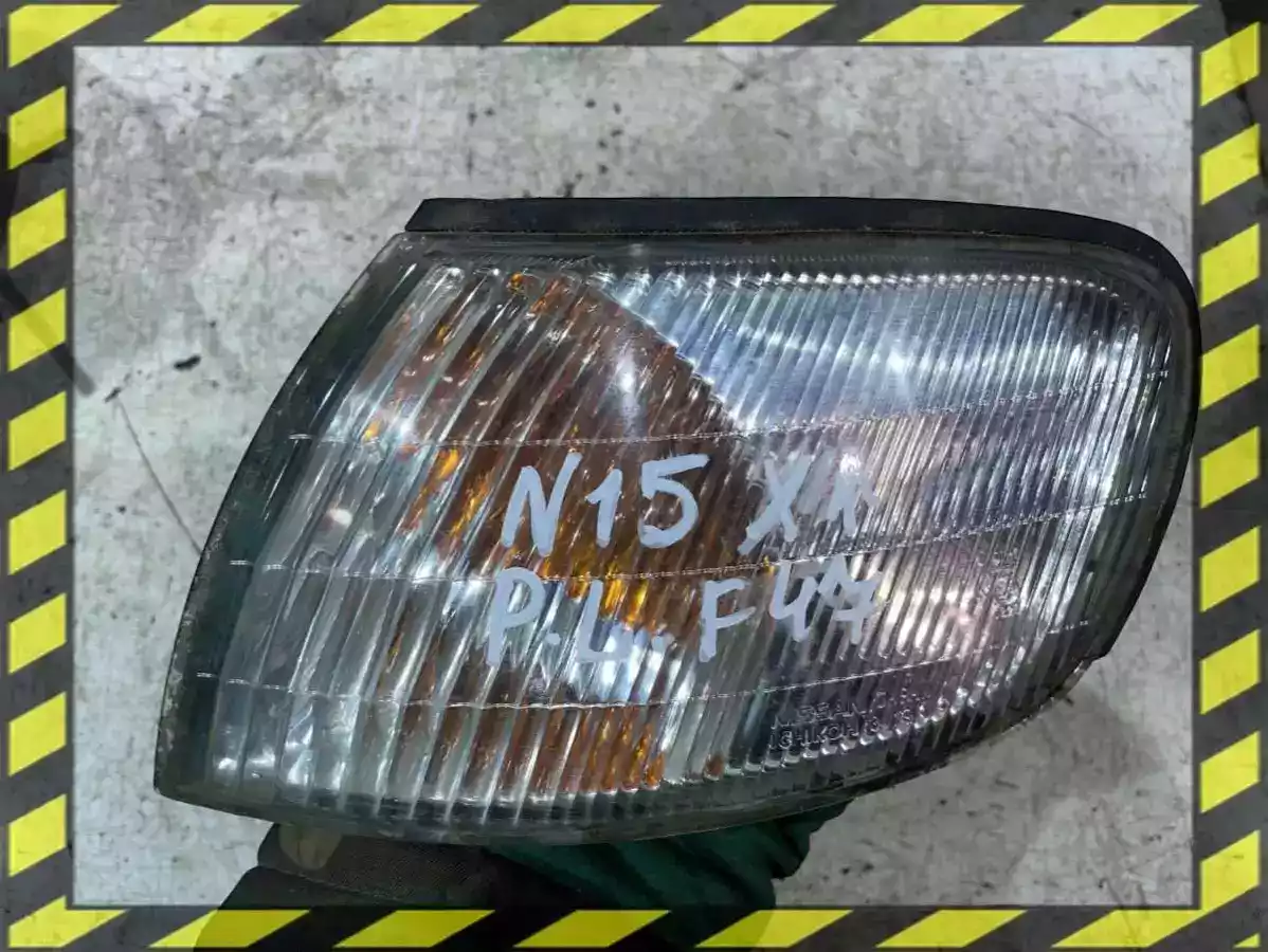 Поворотник левый к Nissan Almera 1999