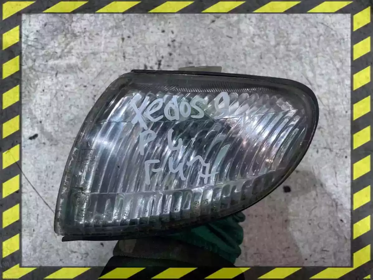 Поворотник левый к Mazda Xedos 6 1996
