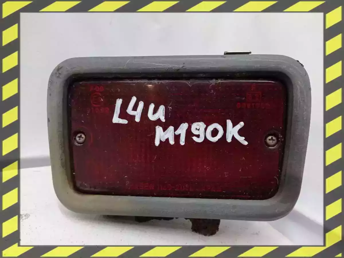 Фонарь противотуманный левый к Mitsubishi Lancer 1995