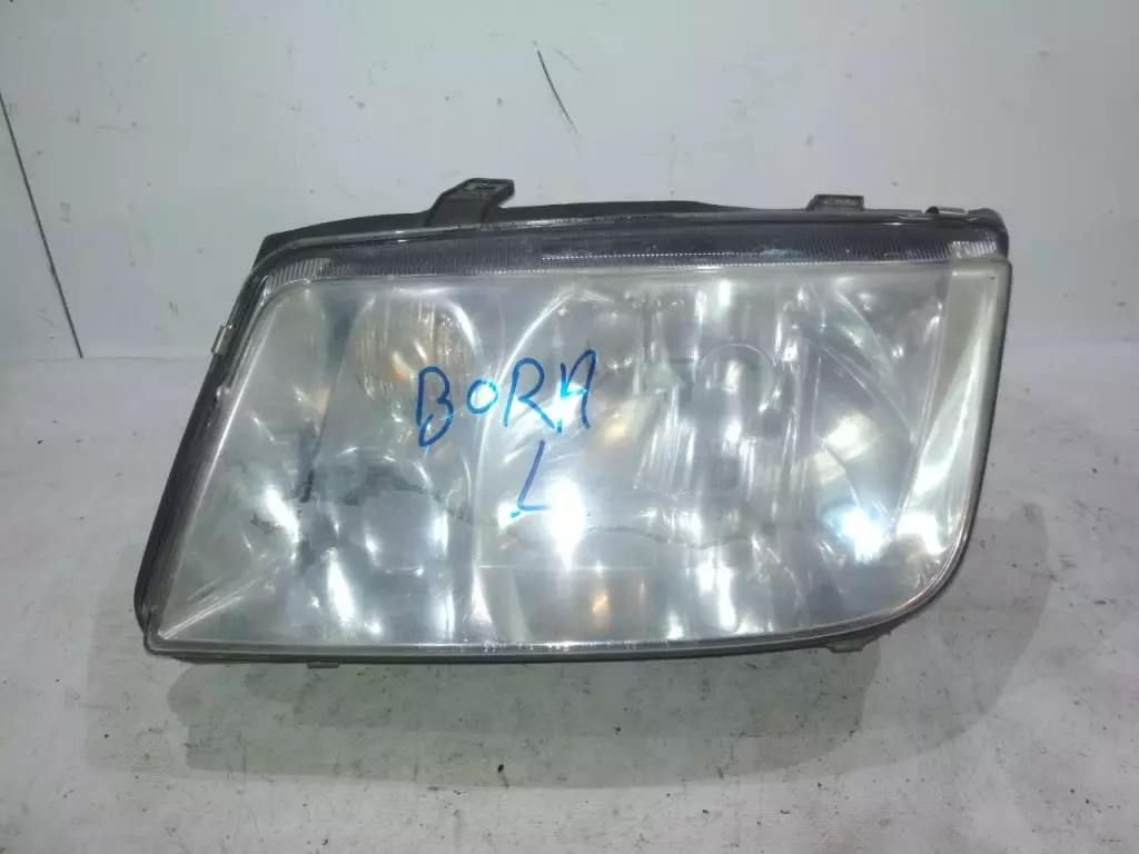 Фара левая к Volkswagen Bora 2000