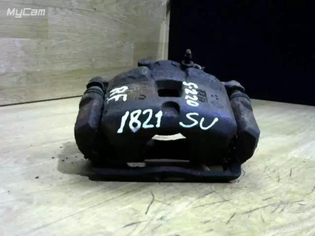 Суппорт передний левый к Subaru Impreza 2000