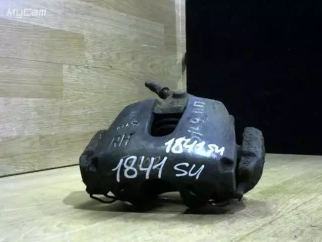 Суппорт передний левый к Ford Focus 2005