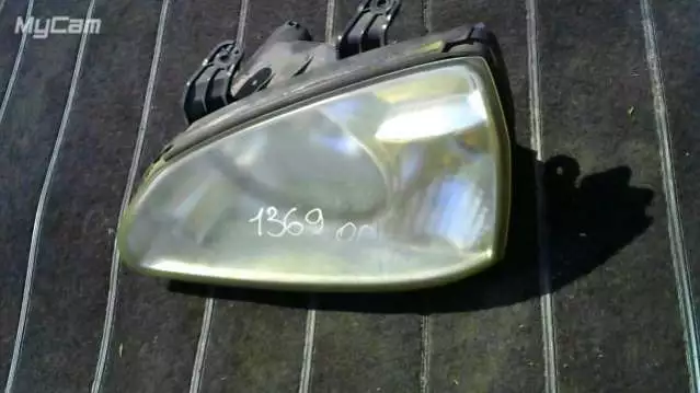 Фара левая к Kia Carens 2002