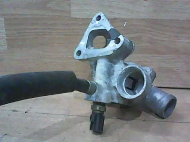 Корпус термостата к Mitsubishi Lancer 2002