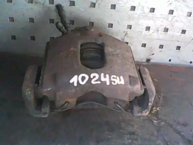 Суппорт передний левый к Mazda 2 2003