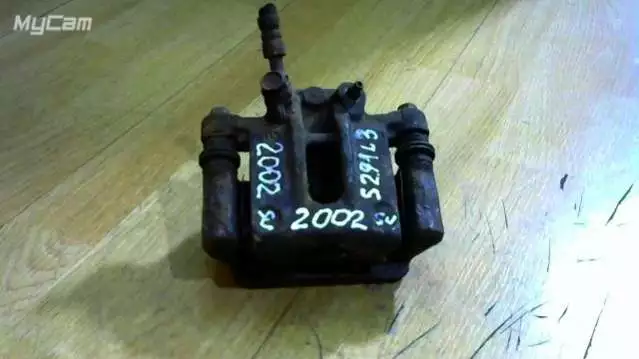 Суппорт задний левый к Toyota Corolla 2004