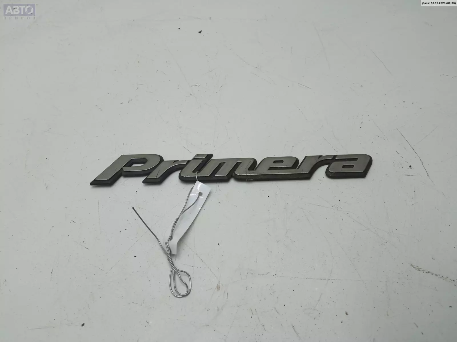Эмблема к Nissan Primera 1998