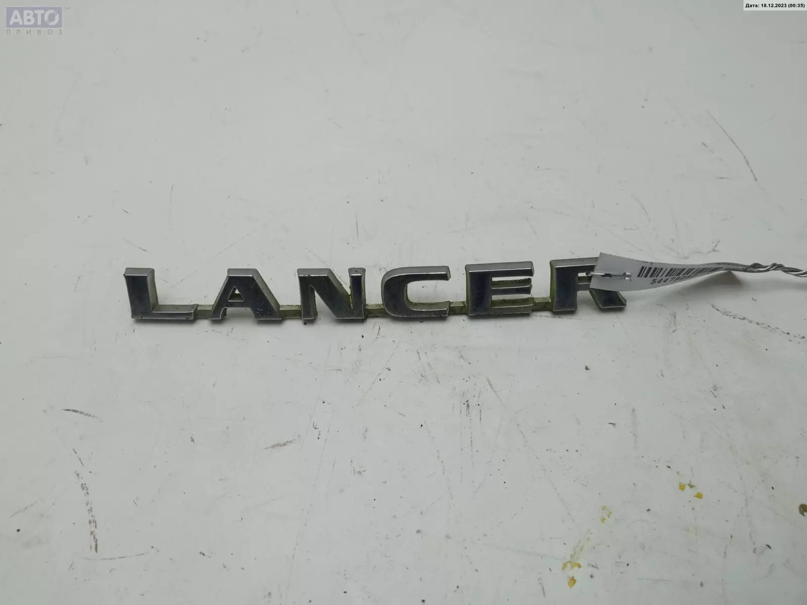 Эмблема к Mitsubishi Lancer 2003