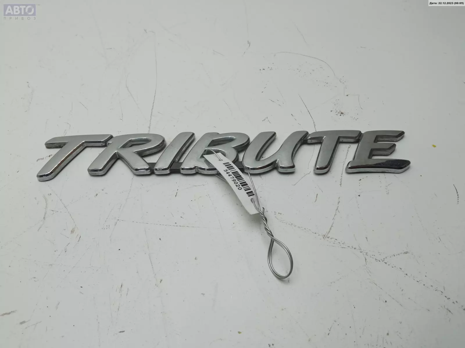Эмблема к Mazda Tribute 2003