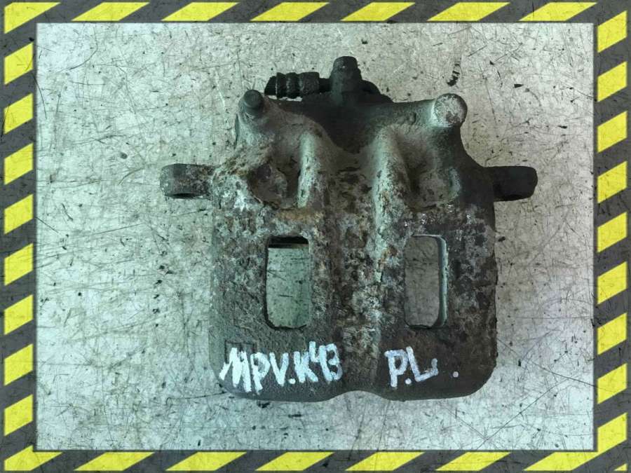 Суппорт передний левый к Mazda MPV 1997