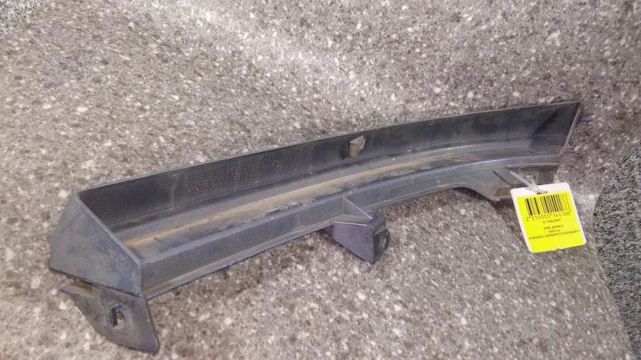 Ус под фару правый к Opel Zafira 2002