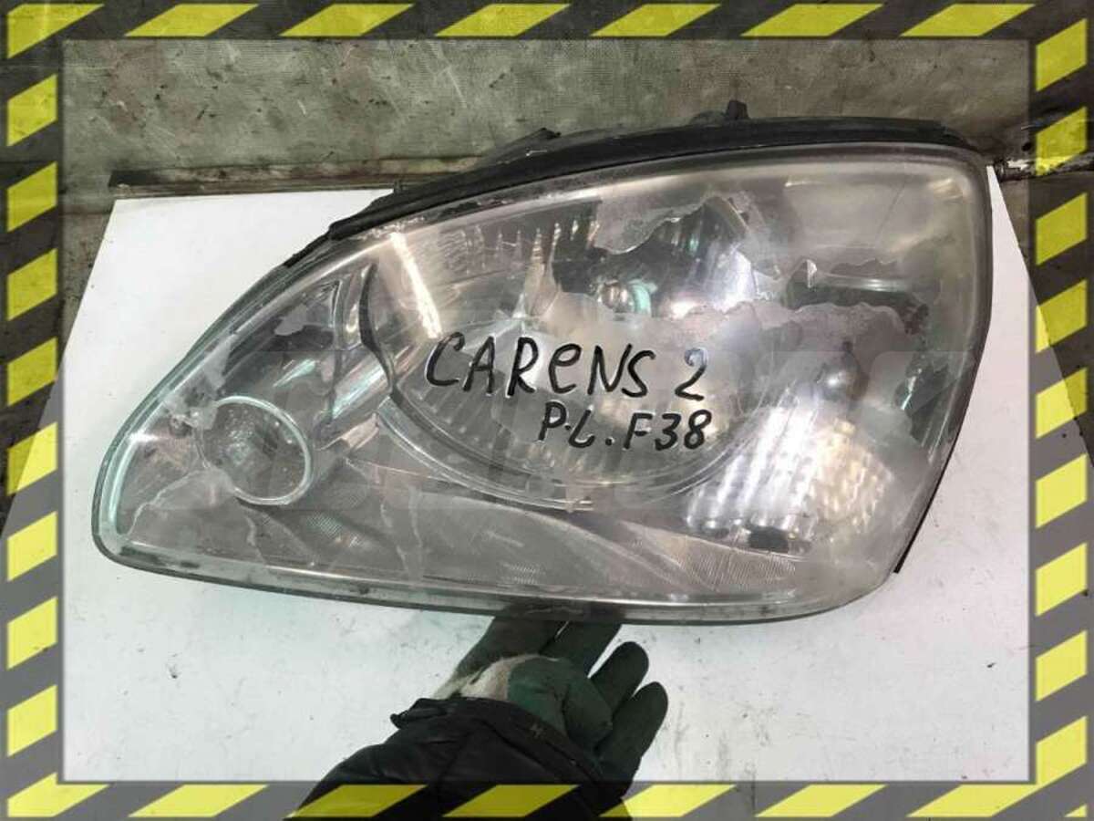Фара левая к Kia Carens 2003