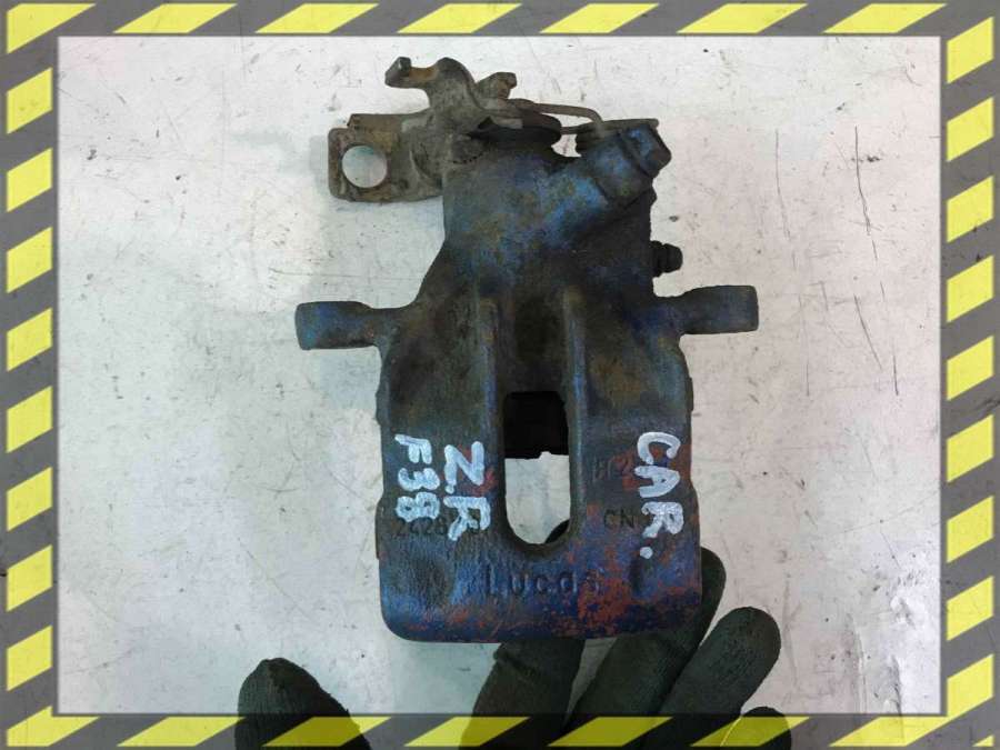 Суппорт задний левый к Mitsubishi Carisma 1999