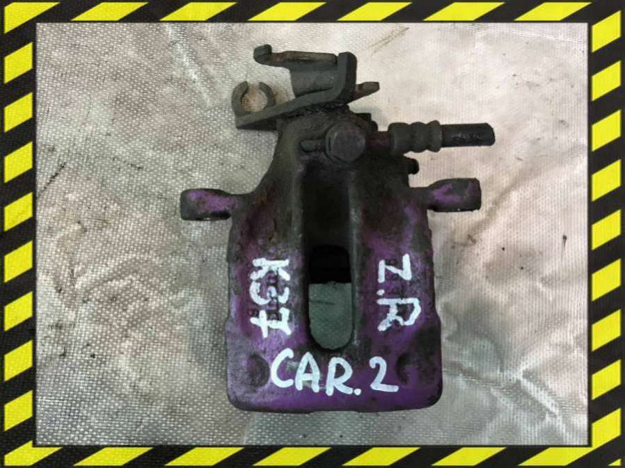 Суппорт задний левый к Mitsubishi Carisma 2002