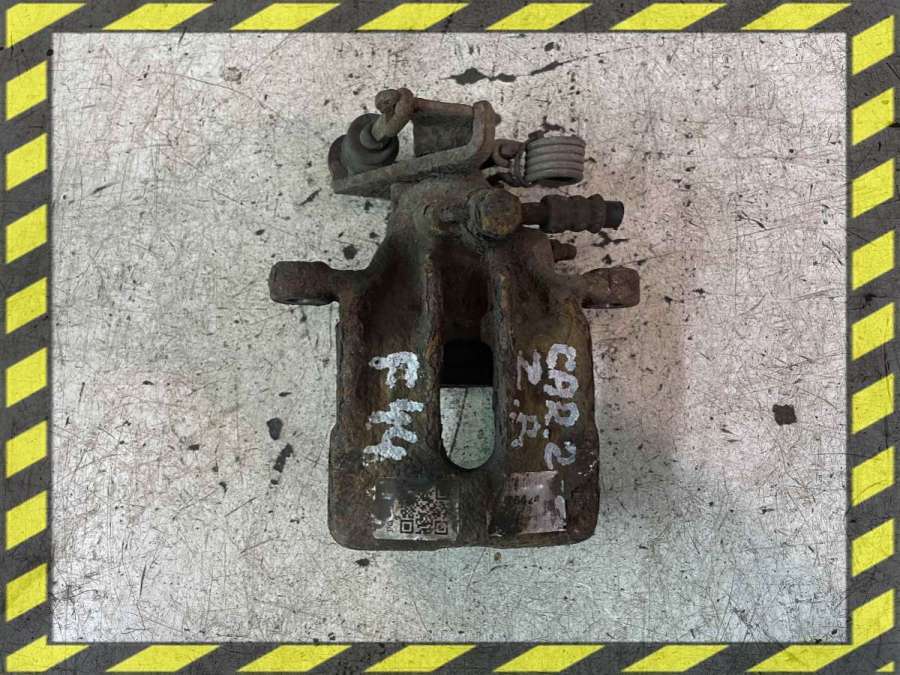 Суппорт задний левый к Mitsubishi Carisma 2001