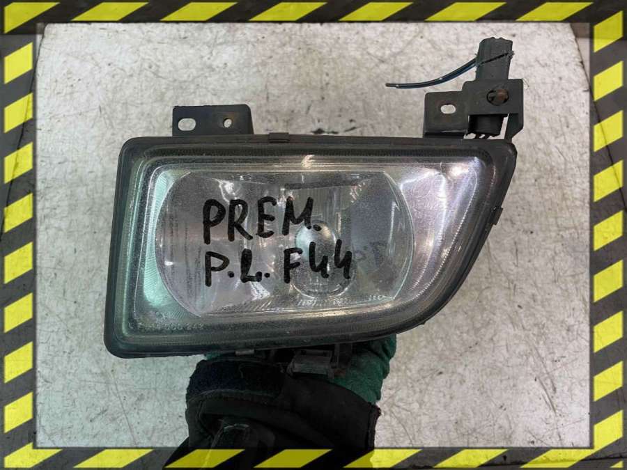 Фара противотуманная левая к Mazda Premacy 2000