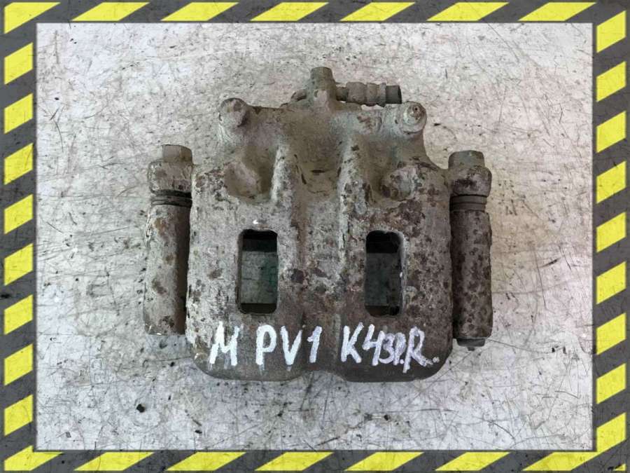Суппорт передний левый к Mazda MPV 1997
