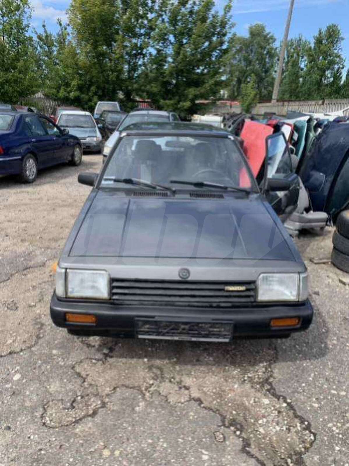Фара левая к Mazda 323 1982