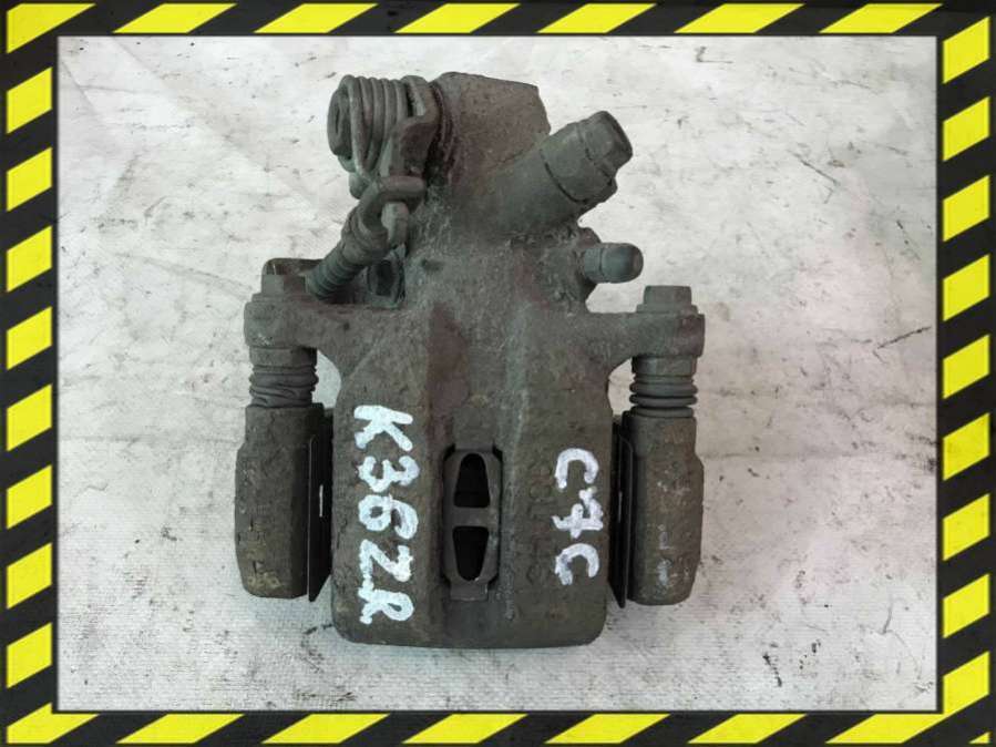 Суппорт задний левый к Honda Civic 2003