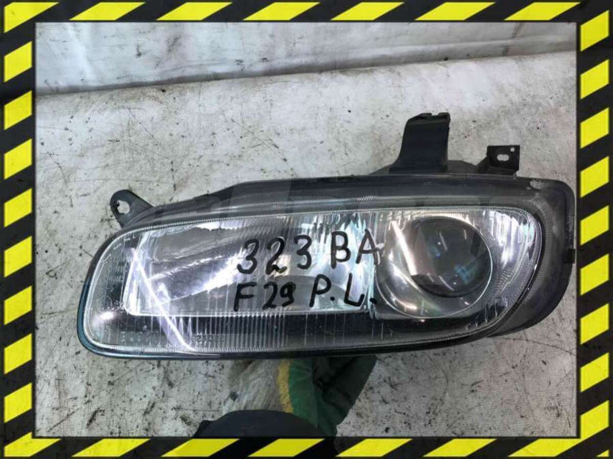 Фара левая к Mazda 323 1996