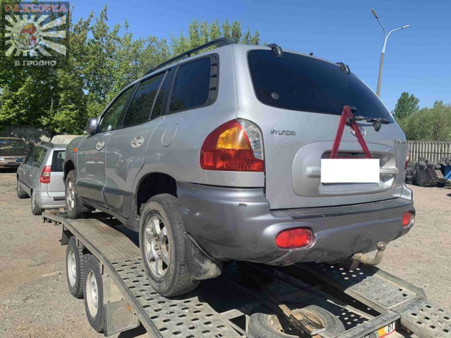 Стекло заднее к Hyundai Santa Fe 2002