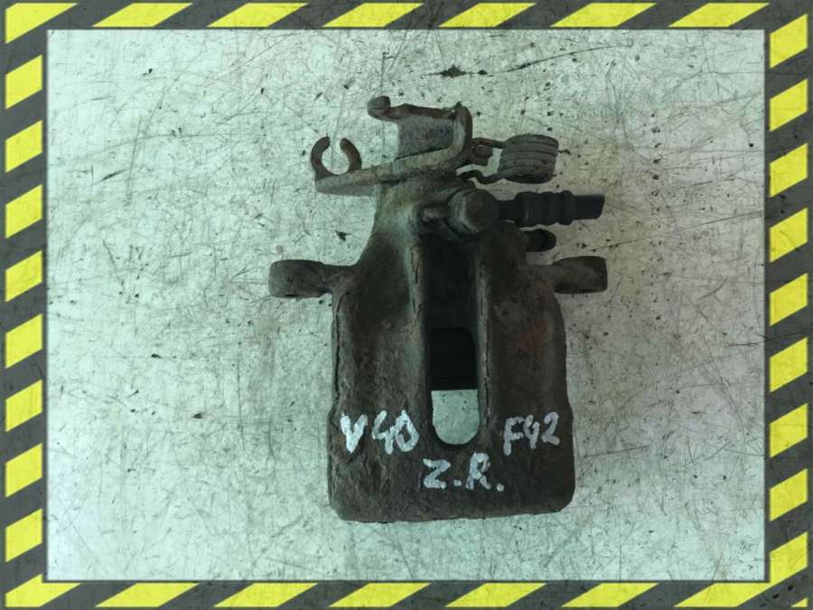 Суппорт задний левый к Volvo V40 1998