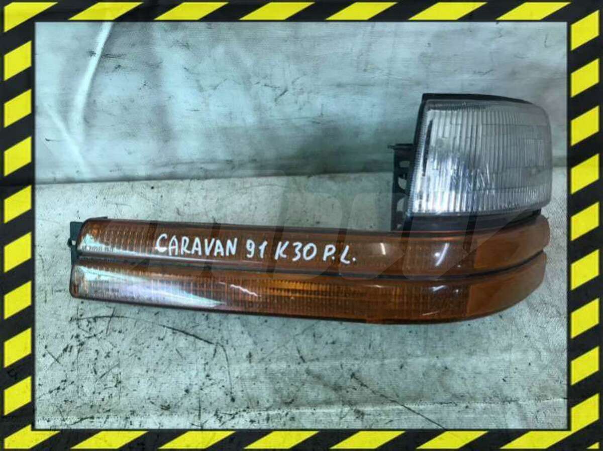 Поворотник левый к Dodge Caravan 1991