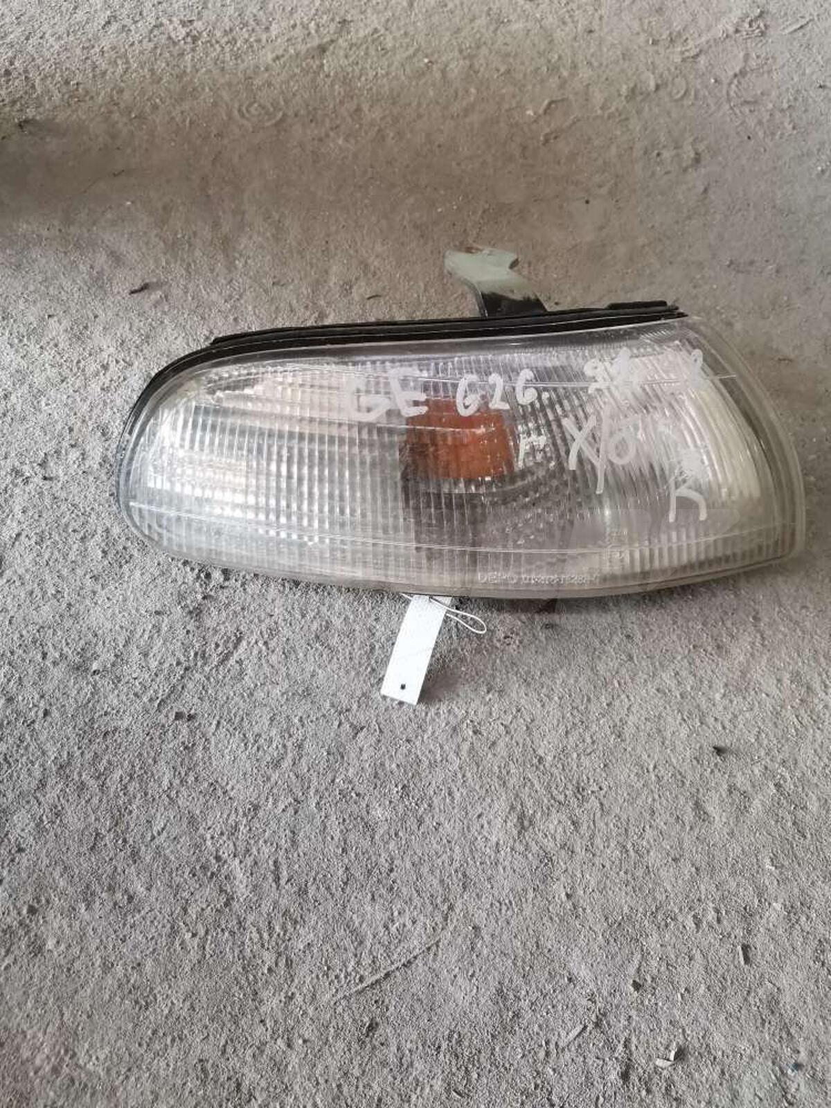 Поворотник правый к Mazda 626 1997