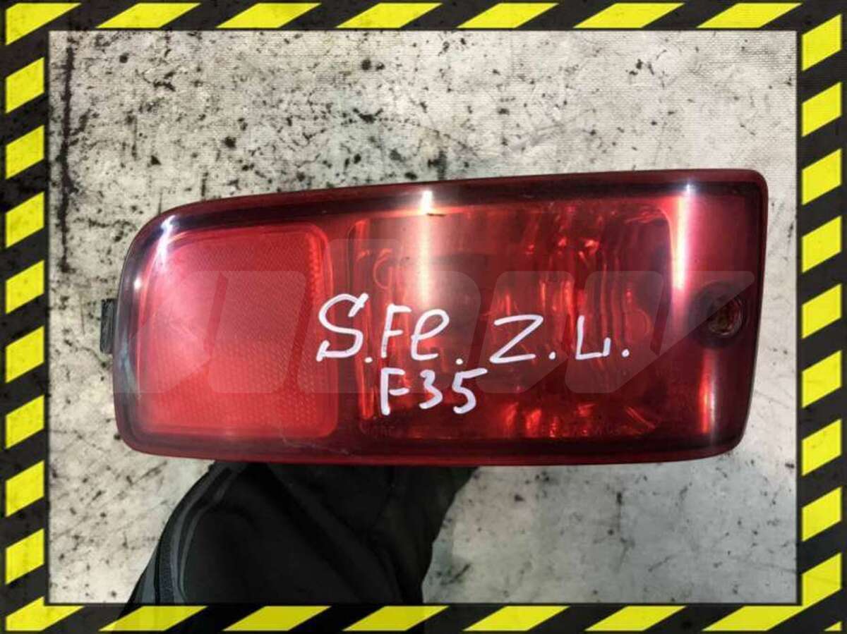 Фонарь противотуманный левый к Hyundai Santa Fe 2006
