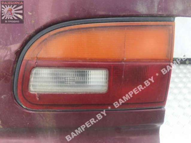 Фонарь крышки багажника правый к Mitsubishi C4 1998