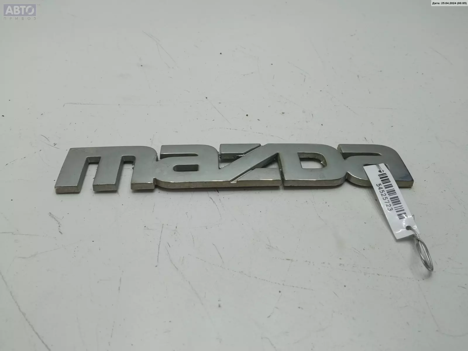 Эмблема к Mazda Tribute 2001