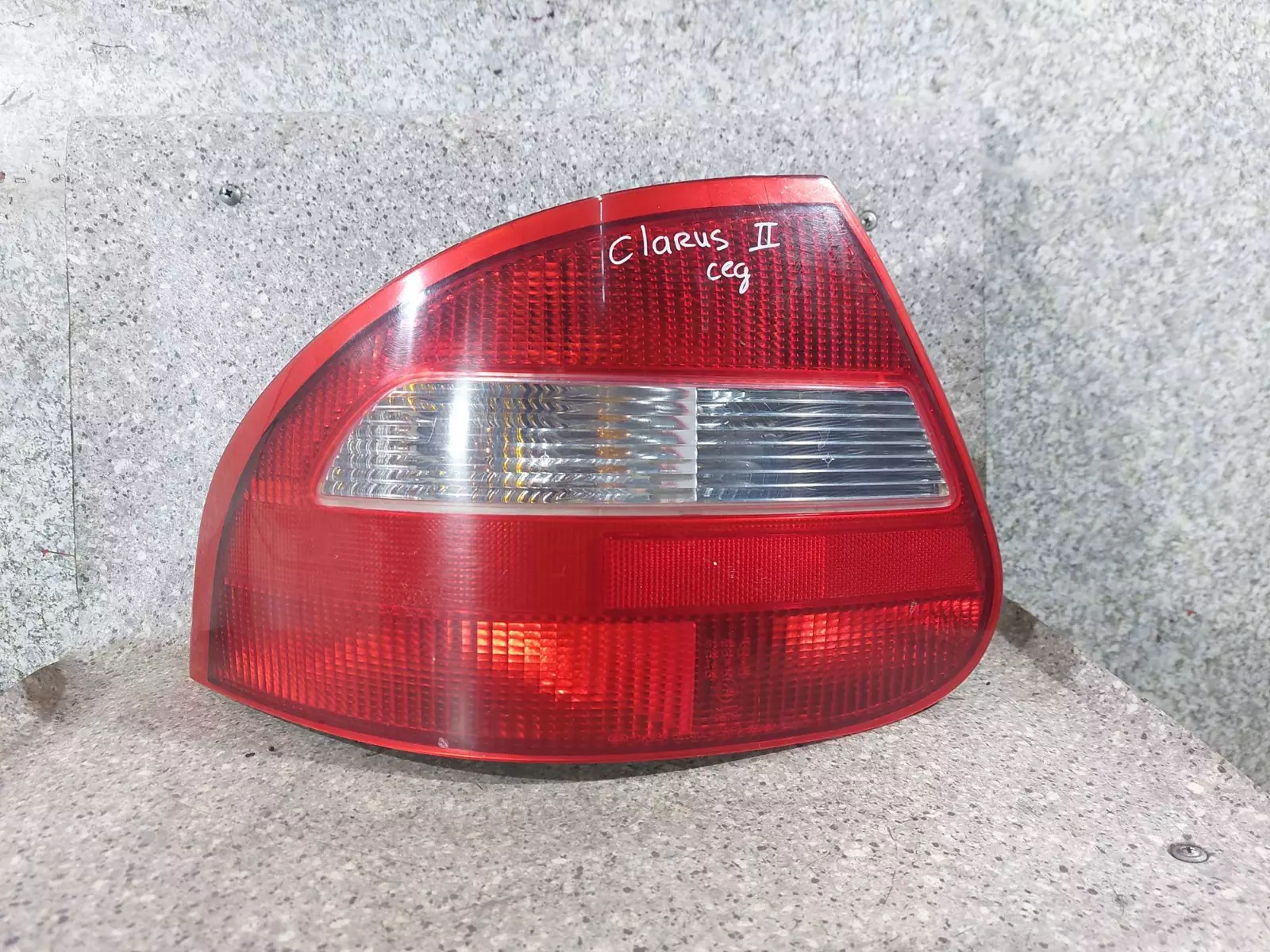 Фонарь задний левый к Kia Clarus 2000