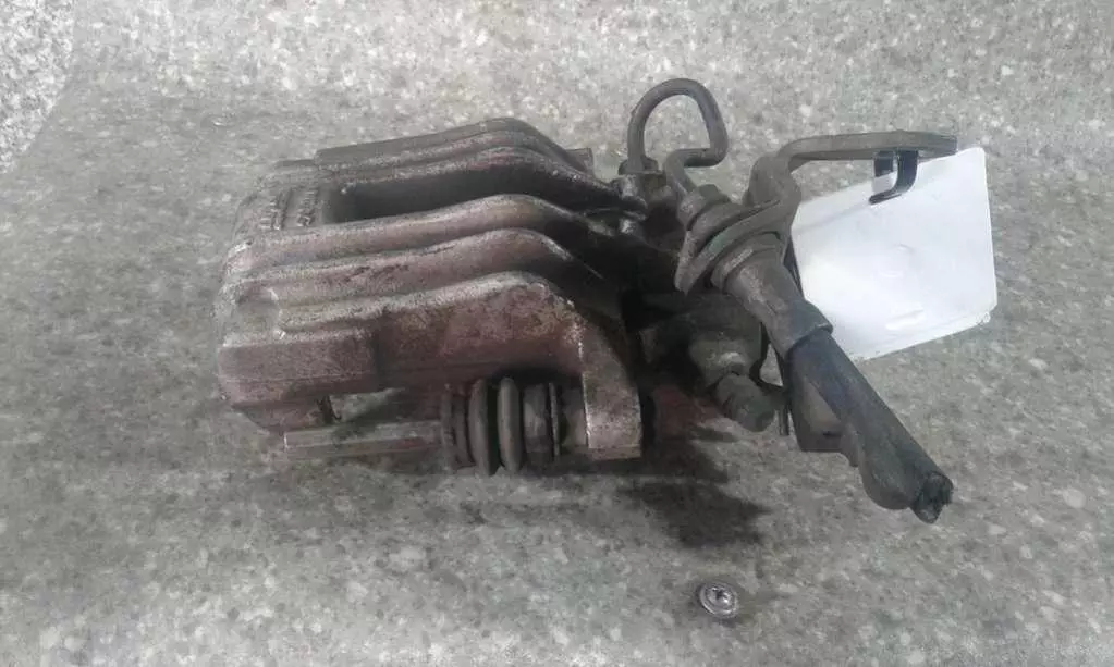 Суппорт задний левый к Audi A3 2006