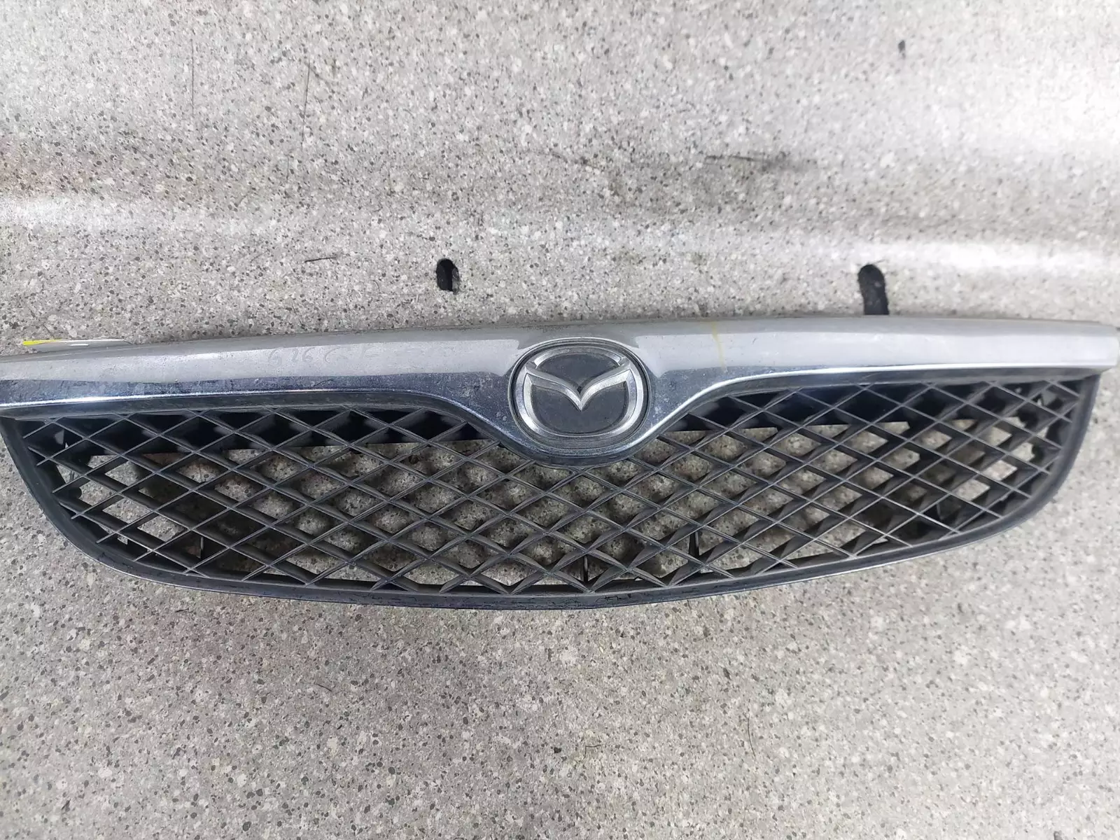 Решетка радиатора к Mazda 626 1998