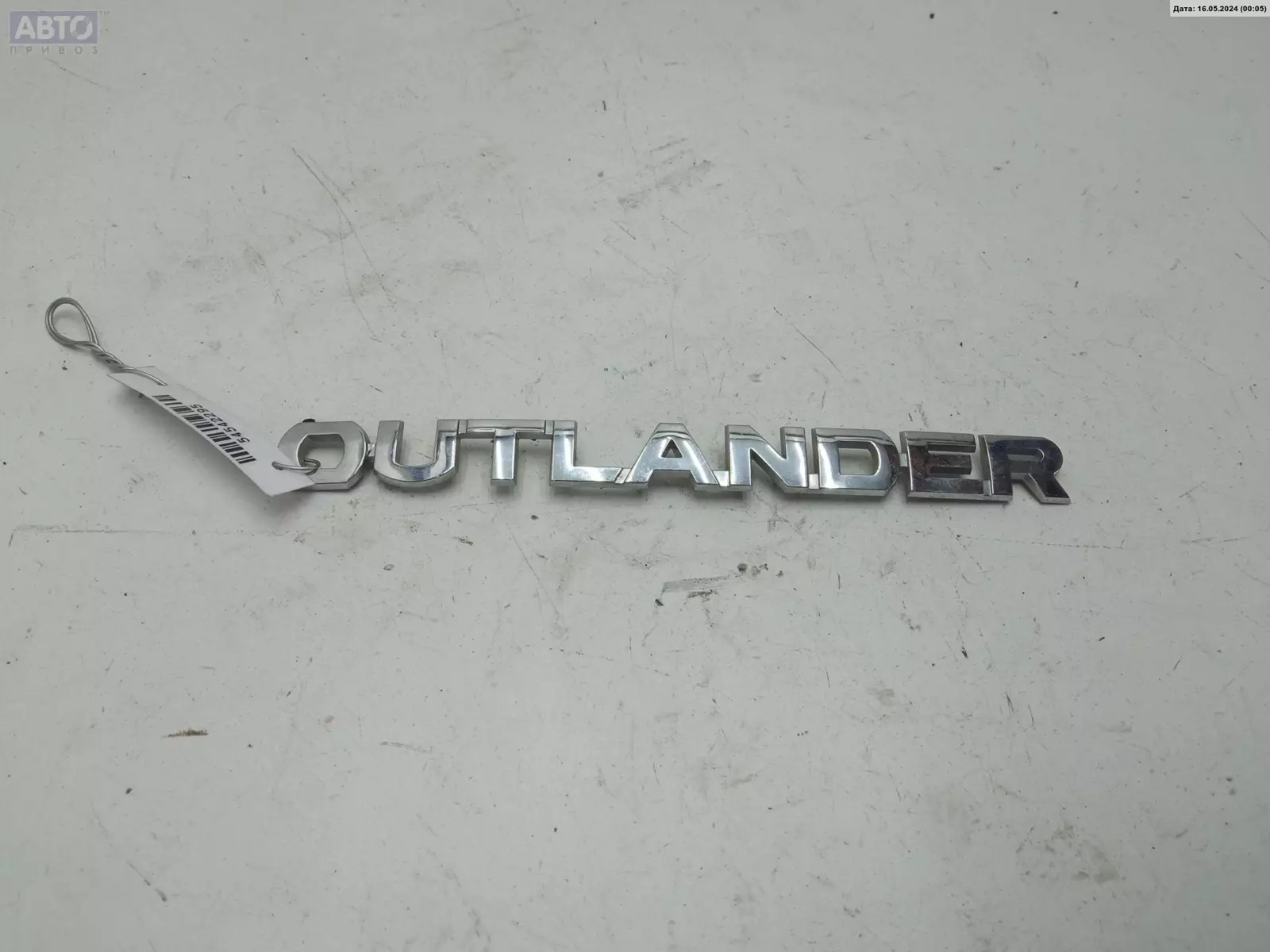 Эмблема к Mitsubishi Outlander 2010