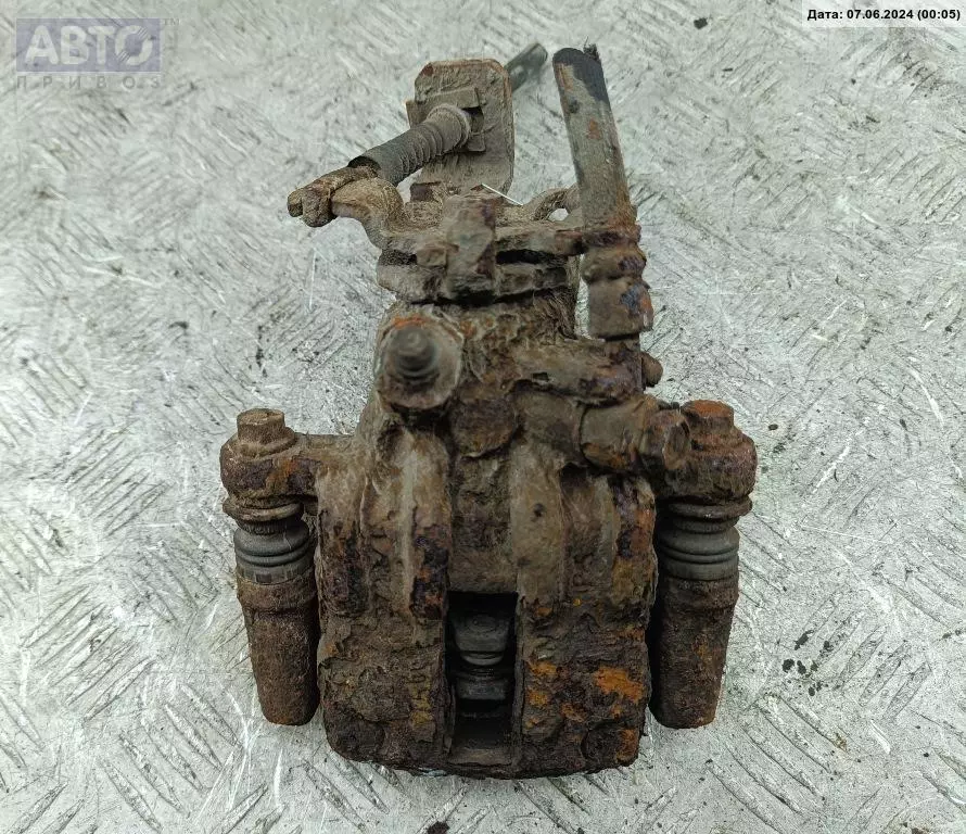 Суппорт к Nissan Almera 2004