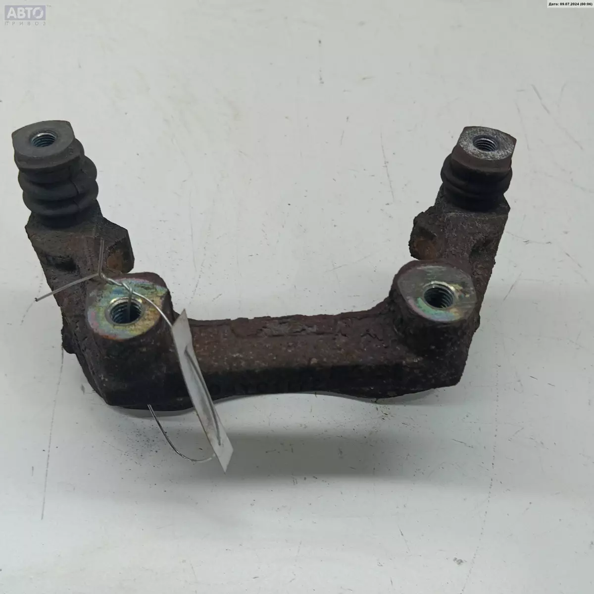 Скоба суппорта к Ford Mondeo 2001