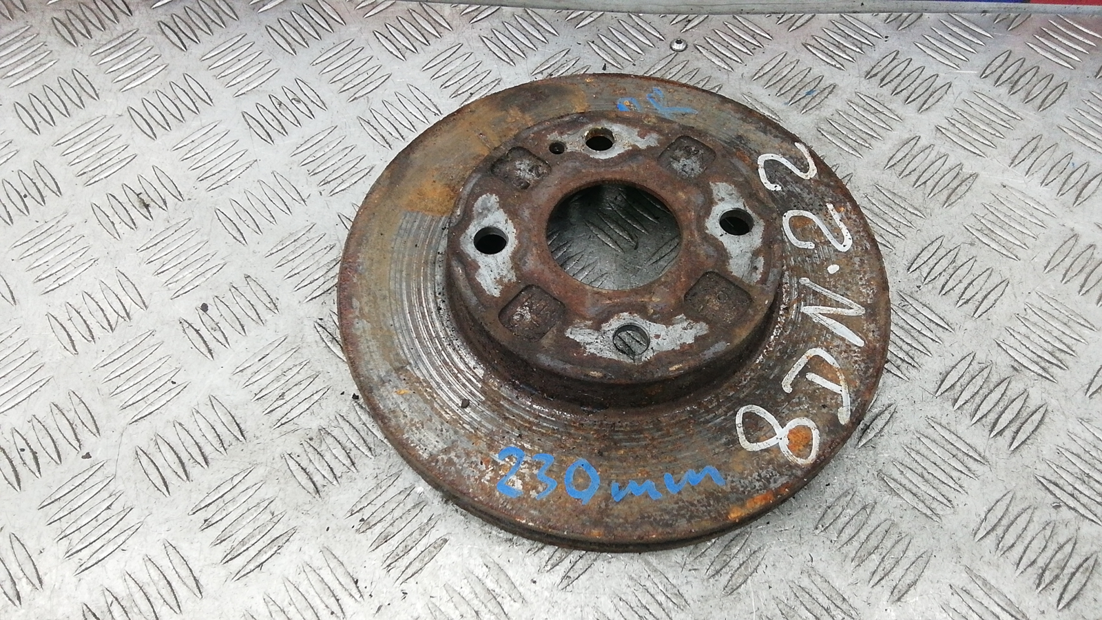 Диск тормозной передний к Mazda 323 2003