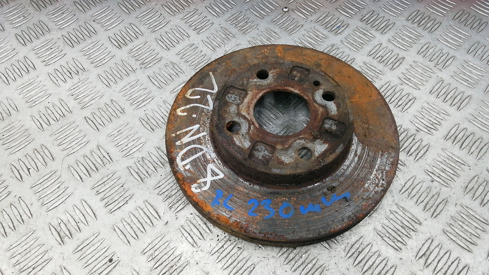 Диск тормозной передний к Mazda 323 2003