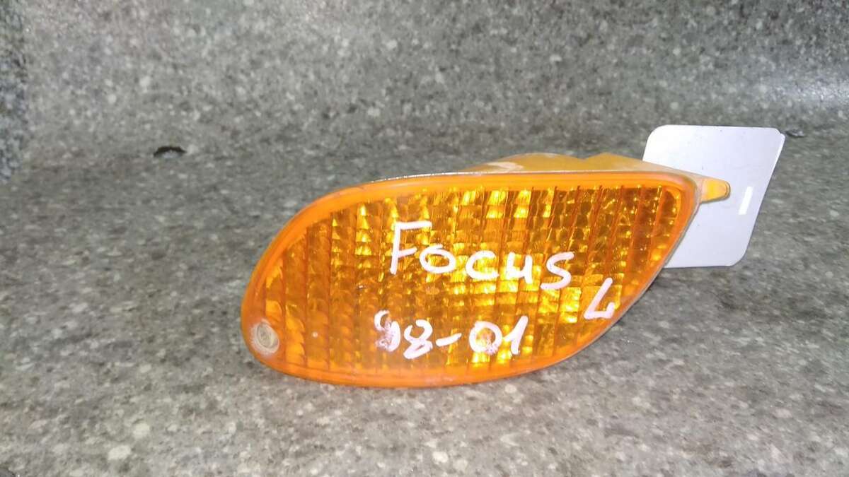 Поворотник левый к Ford Focus 2000