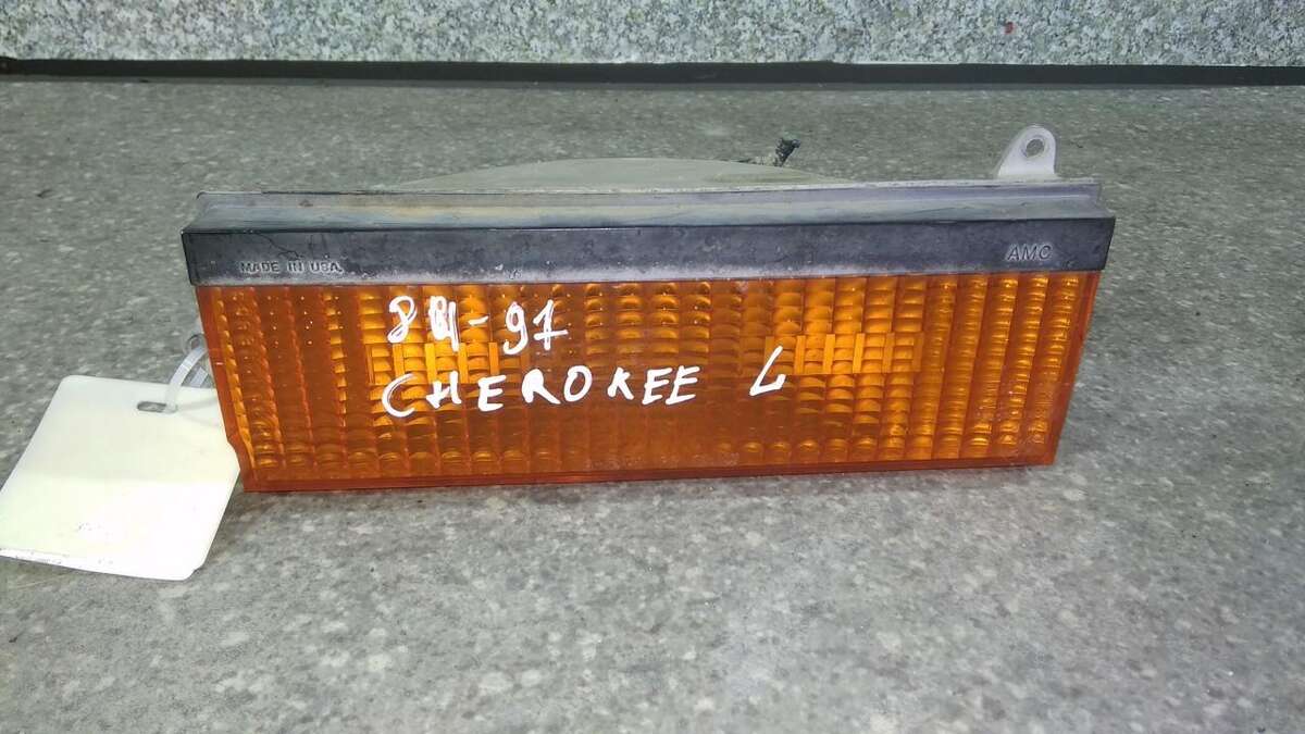 Поворотник левый к Jeep Cherokee 1991