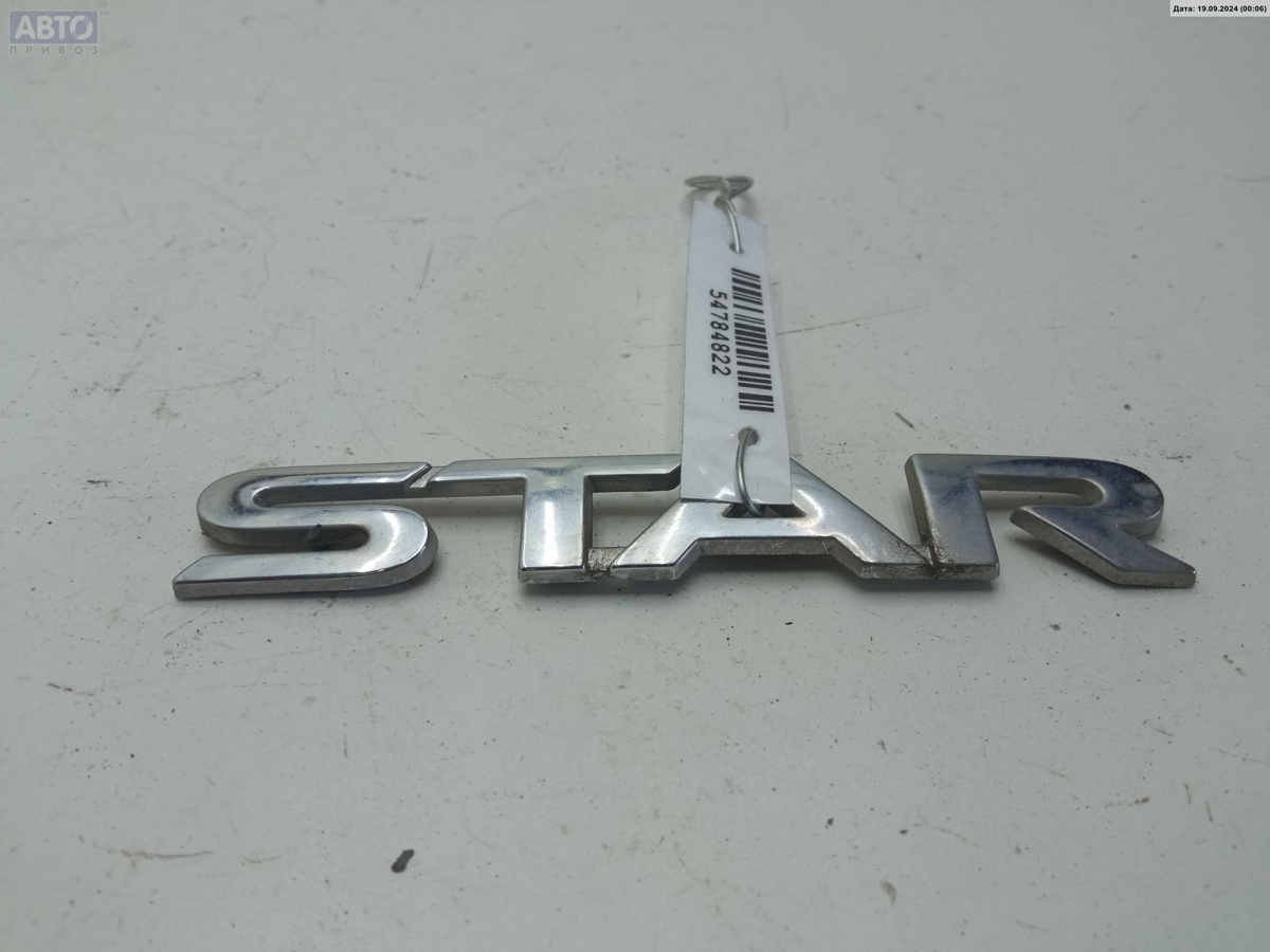 Эмблема к Mitsubishi Space Star 1999