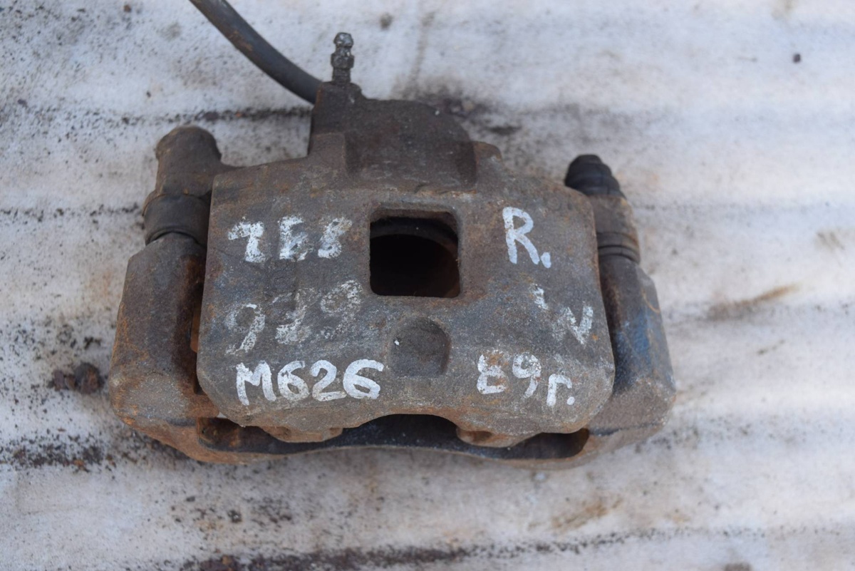 Суппорт передний правый к Mazda 626 1989