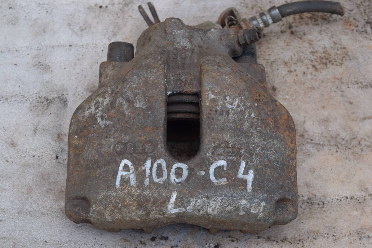 Суппорт передний левый к Audi 100 1993
