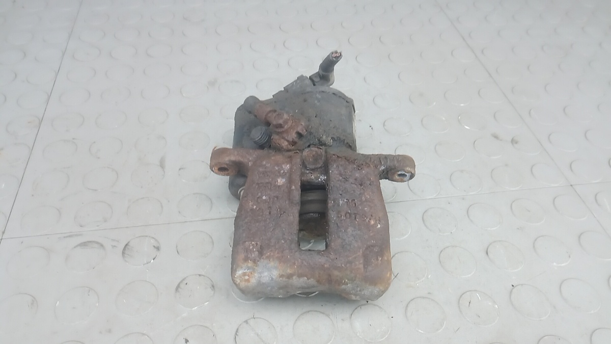 Суппорт задний левый к Volkswagen Passat CC 2011