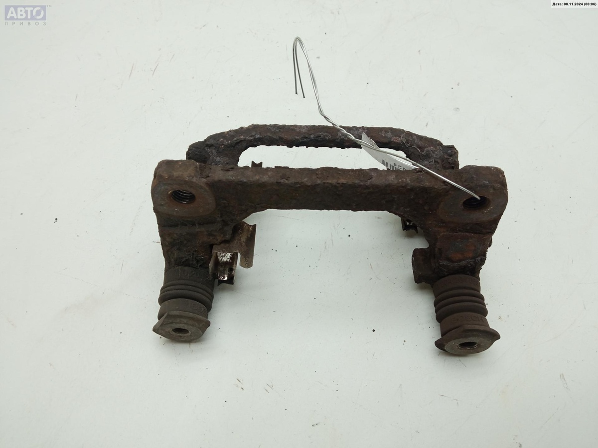 Скоба суппорта к SEAT Toledo 2001