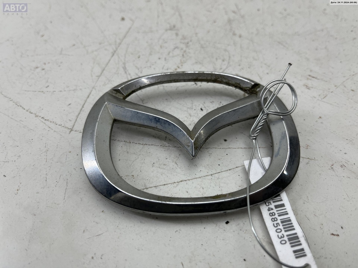 Эмблема к Mazda Premacy 2004