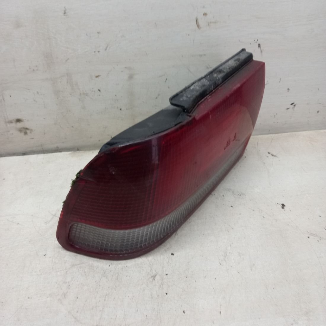 Фонарь задний левый к Mitsubishi Lancer 1991